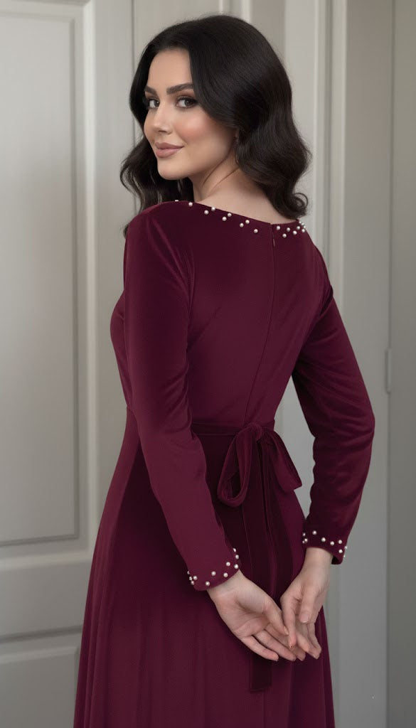 Luxurious Long-Sleeve Velvet Gown with Beaded Neckline and Cuffs