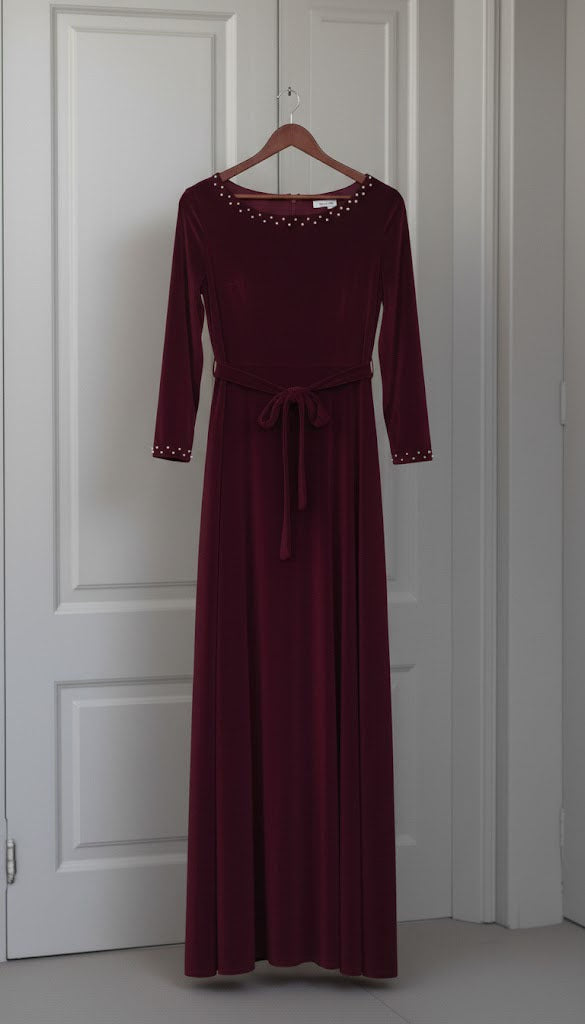 Luxurious Long-Sleeve Velvet Gown with Beaded Neckline and Cuffs