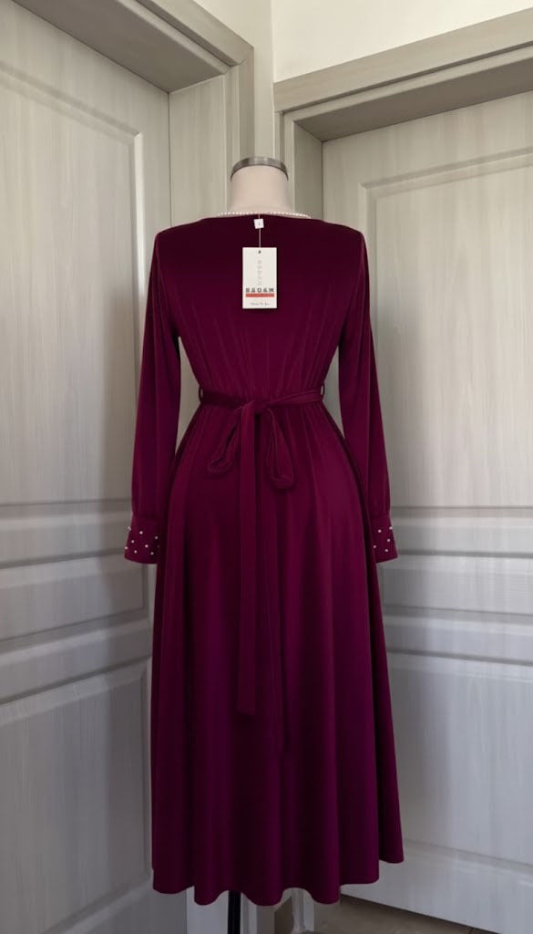 Luxurious Long-Sleeve Velvet Gown with Beaded Neckline and Cuffs
