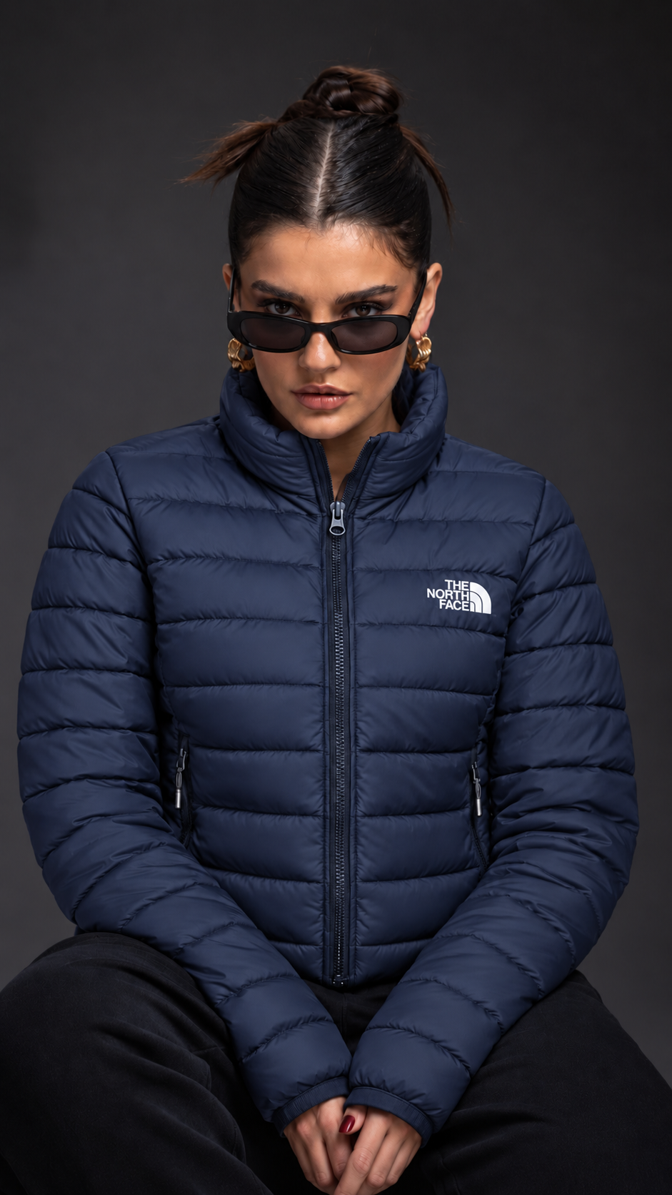 Navy quilted jacket — front-facing pose