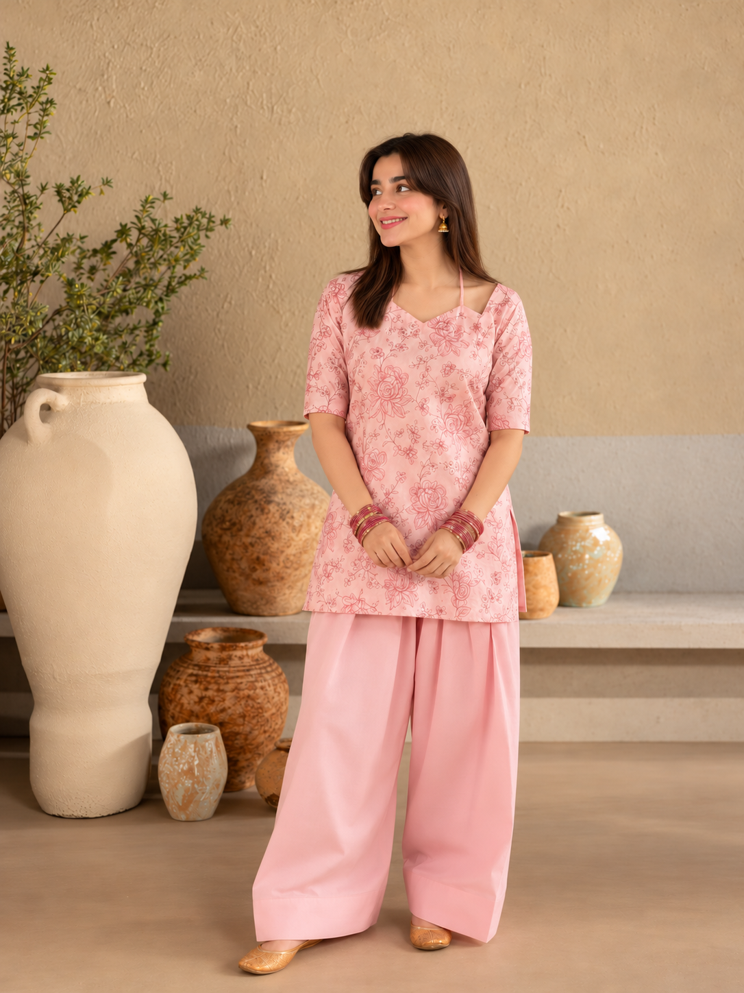 Bahaar Bloom pink floral crepe shirt with plain wide-leg trousers, relaxed front view.