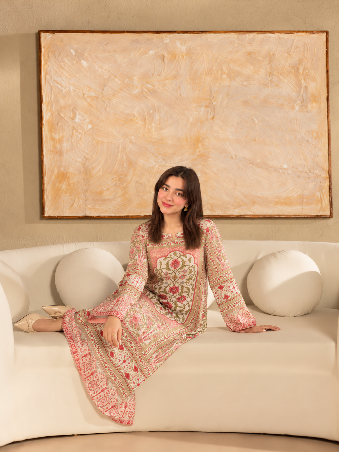 Gulistan Kaftan ivory, pink and olive printed crepe two-piece outfit, seated view.