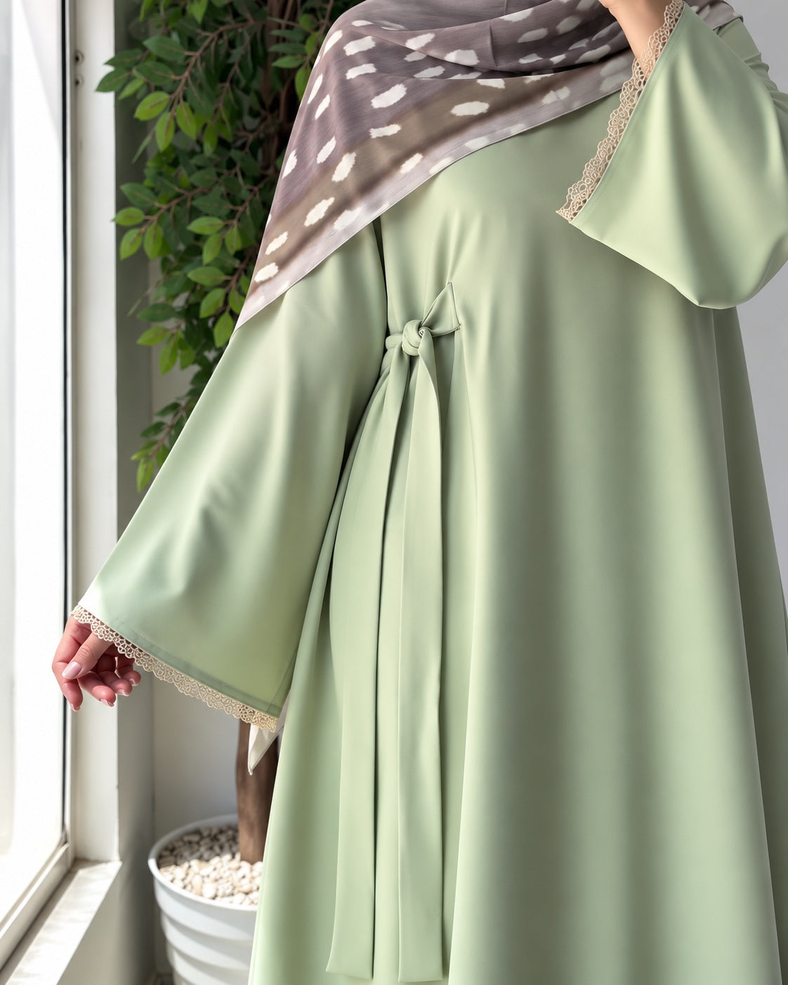 Inaya Bloom Abaya, close-up of lace cuffs and matching side tie.