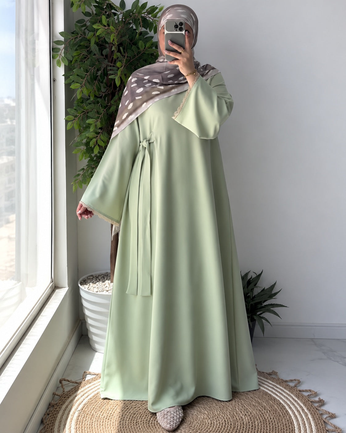 Inaya Bloom Abaya in sage green, full-length front view. Scarf not included.