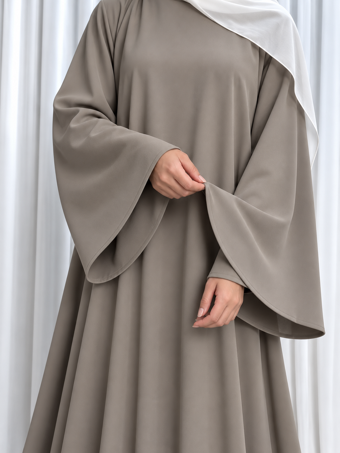 Nazakat Abaya in Warm Grey Nida fabric, sleeve detail view. Abaya only; hijab not included.